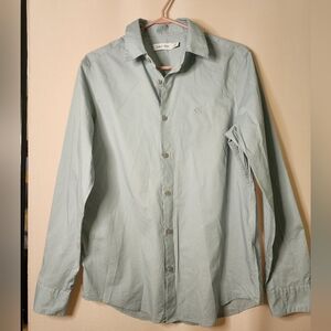 Calvin Klein light blue button down shirt, size small